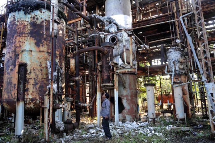 gas-disaster gas disaster India ut-of-court settlement