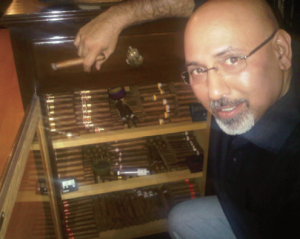 A luxury indulgence: Neeraj Tuli shows off his cigar collection.