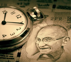 Rupees_and_clock-CMYK
