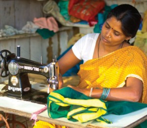Woman_tailoring,_sewing_sari