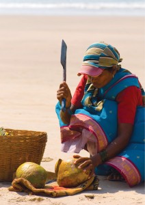 Indian_woman_cutting_coconut-Probiotic_food