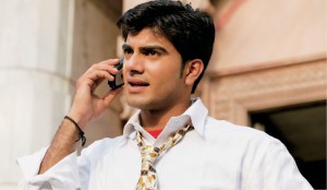 Indian_man_using_mobile_phone