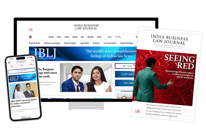 Monitor and phone with IBLJ website on the screens, and an IBLJ issue cover on the right