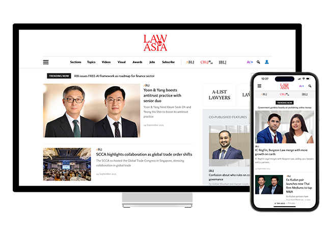 A monitor on the left and a phone on the right with Law.asia homepage screenshots