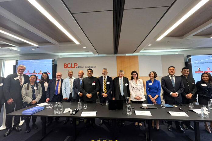 Speakers-and-guests-gather-on-stage Bryan Cave Leighton Paisner